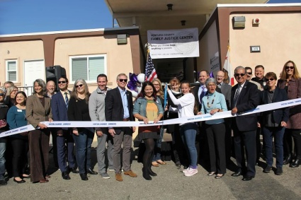 Ribbon cutting with partners and dignitaries